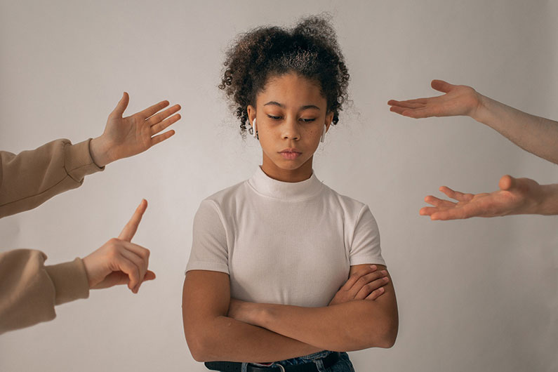 An employee getting yelled at by her employers.