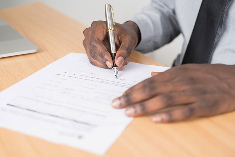 An employer signs a long term disability application form
