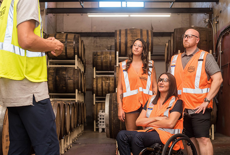  An employee in a wheelchair working in a warehouse